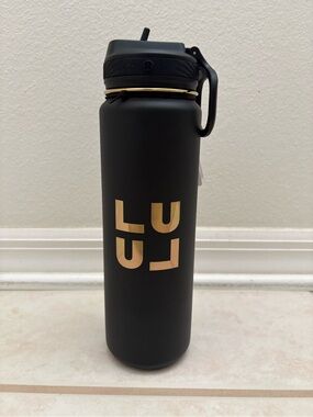 lululemon athletica Black Water Bottle with Gold Logo